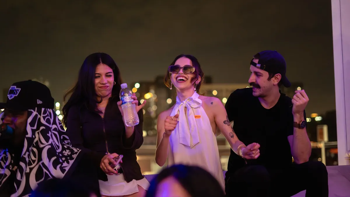 Friends laughing on the rooftop